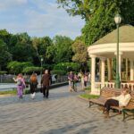 People walk in Kharkiv Shevchenko Park