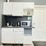 The room features a private kitchen