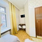 The apartment is located on the ground floor in a quiet and cozy courtyard, offering a peaceful atmosphere despite its central location