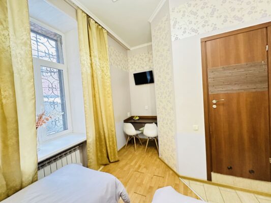 The apartment is located on the ground floor in a quiet and cozy courtyard, offering a peaceful atmosphere despite its central location