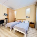 The apartment is a studio featuring two single beds or 1 king size bed