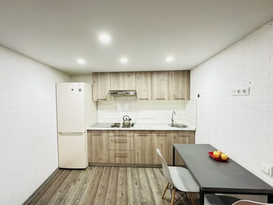 Kitchen in Two-Level Apartment in Kharkiv for Up to 4 Guests